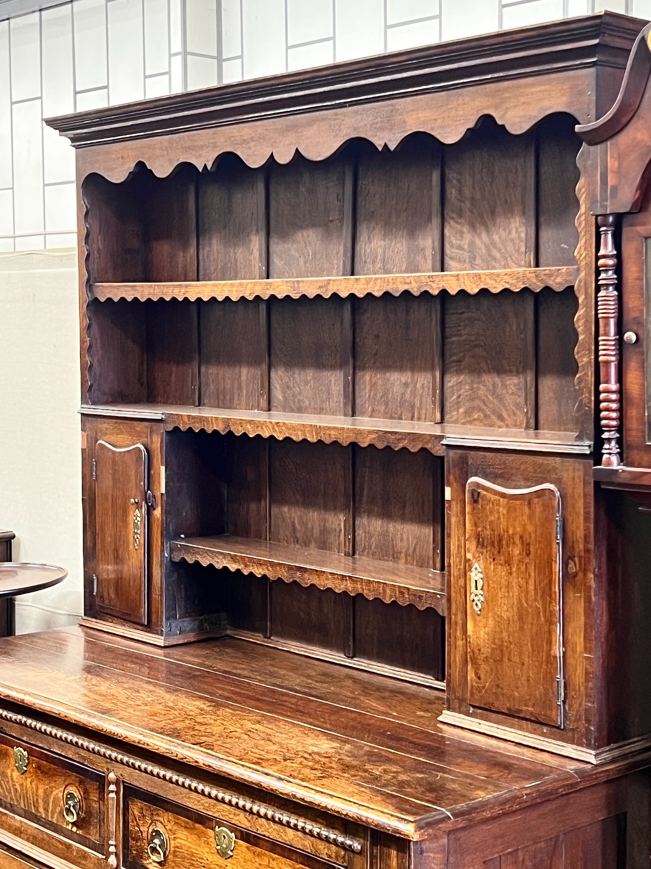 A Victorian oak dresser with boarded rack, width 148cm, depth 58cm, height 206cm